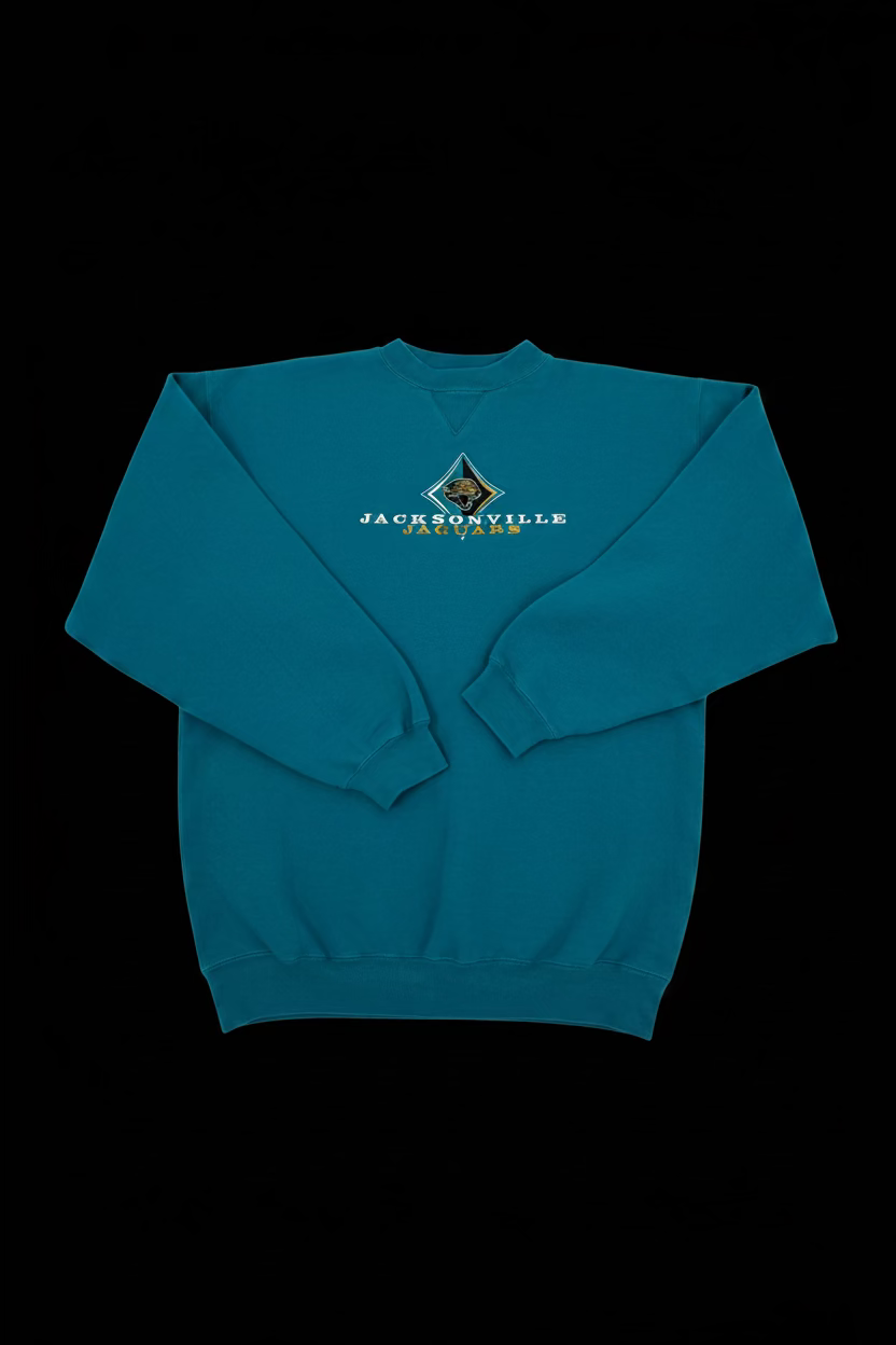 Vintage 90s Jacksonville Jaguars Embroidered Crewneck Sweatshirt by Cadre Athletic