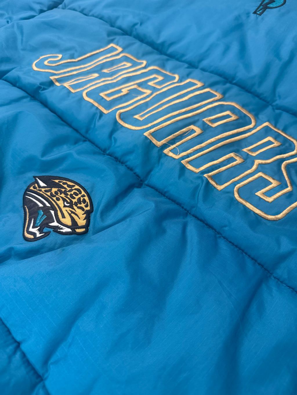 Vintage 90s Jacksonville Jaguars Pro Player NFL Experience Reversible Puffer Jacket
